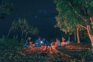 Sitting around the campfire.