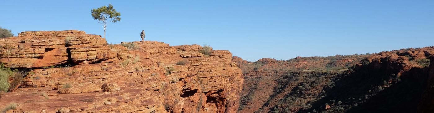 Guide walking the rim of Kings Canyon in the Northen Territory